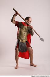 Man Adult Average White Fighting with spear Standing poses Casual